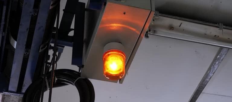 Yellow orange siren light rotary warning light in industrial side safety sign